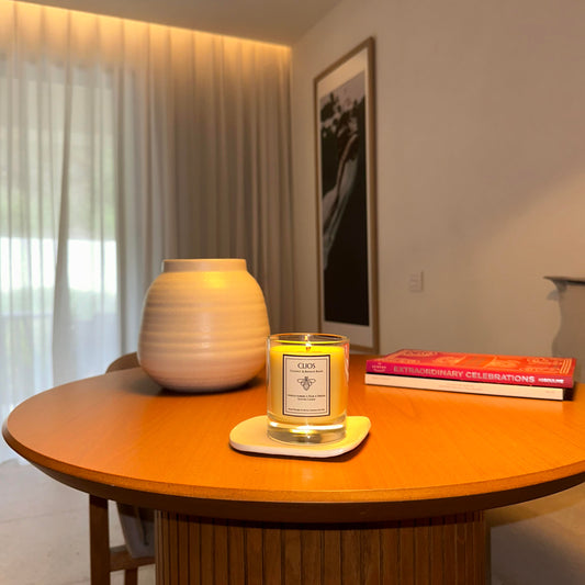"Luxury scented candle by Clios – Golden Hour scent with vanilla embers, pear & freesia – hand-poured in Royal Leamington Spa using coconut and beeswax blend for a clean, even burn."